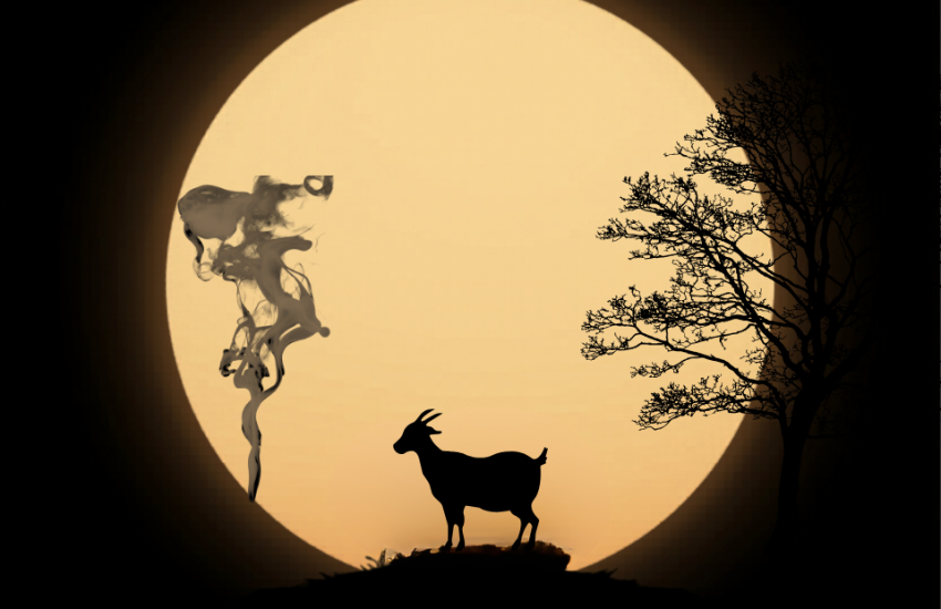 silhouette of a goat on a rock in front of an orange moon with the silhouette of a tree on one side and the silhouette of rising smoke on the other